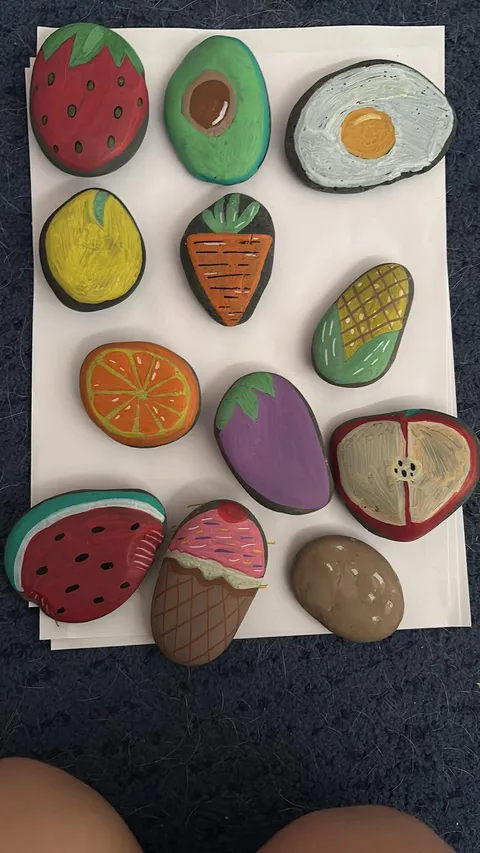 Pebbles hand-painted as fruit and vegetables